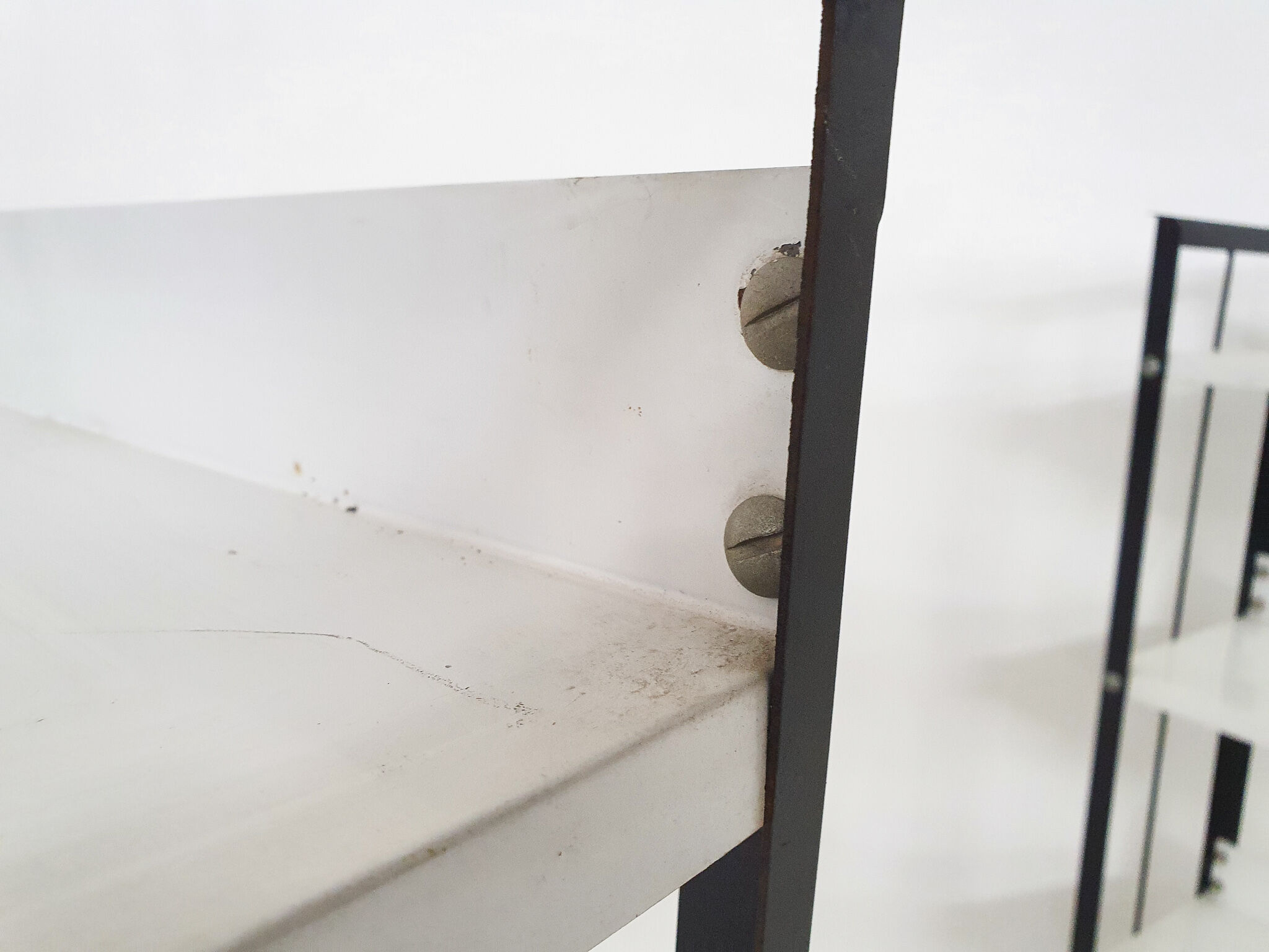 Set of two black and white metal book shelves attrb. to Tomado, Holland, 1950's