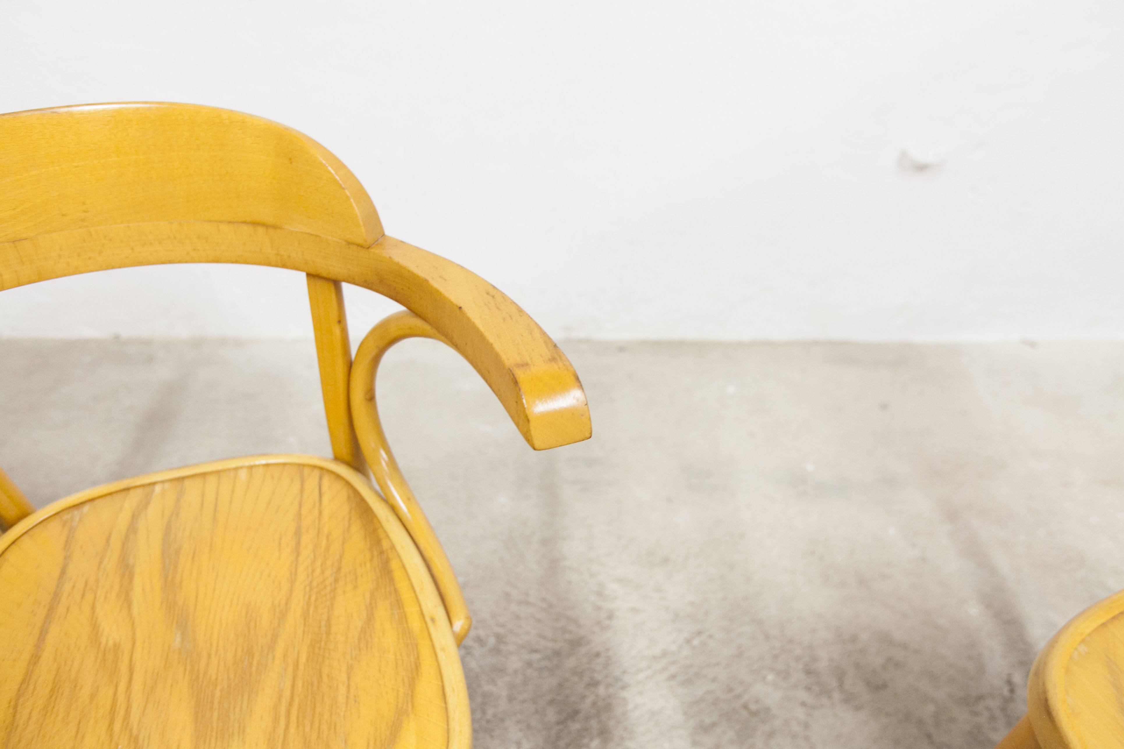 Set of 4 armchair bistro chairs from the 1960s.