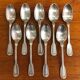 Set of 9 silver-plated metal spoons