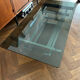 70s design coffee table in rectangular glass with chrome legs.