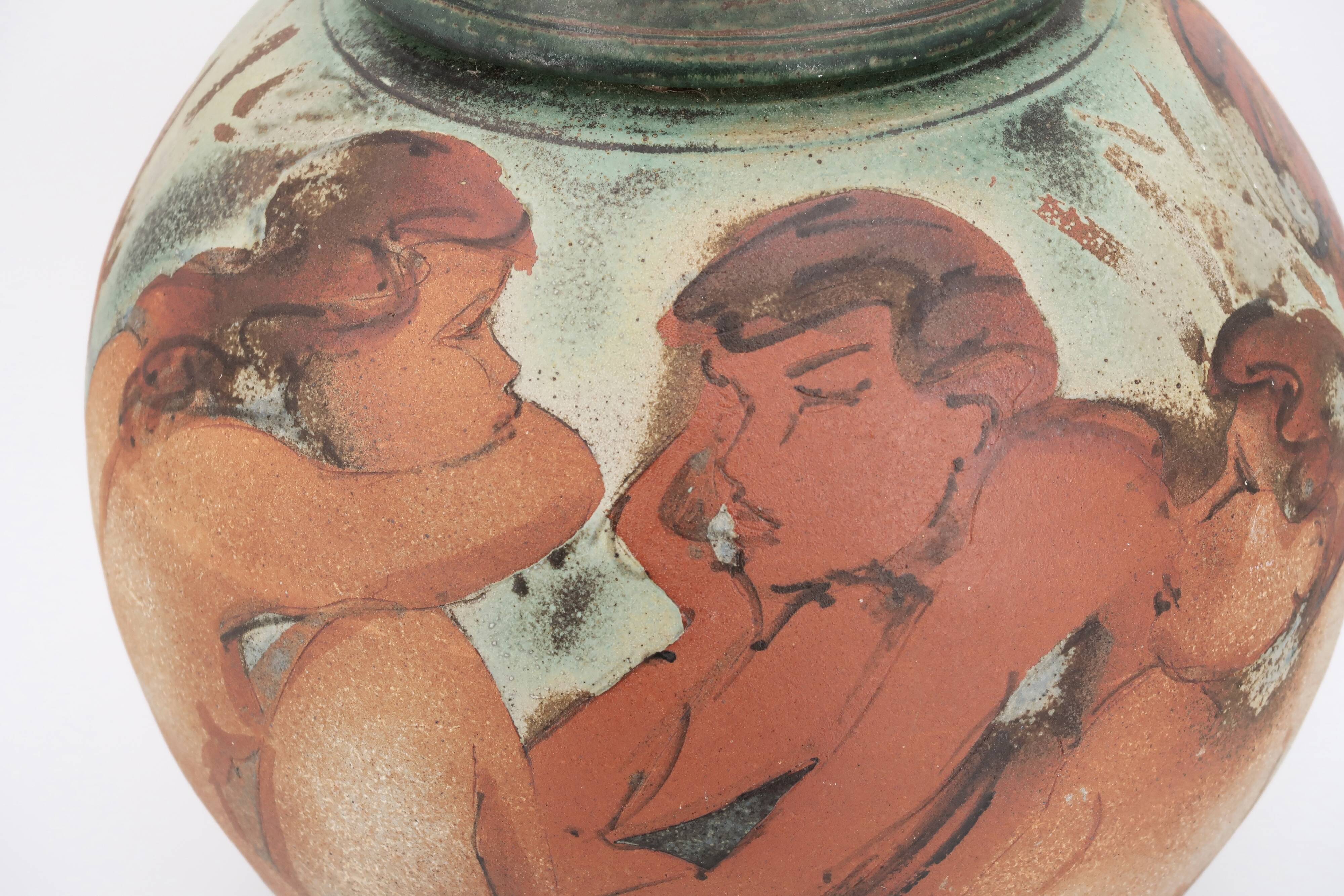 Decorated vase with woman, bathing scene.
