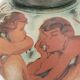 Decorated vase with woman, bathing scene.