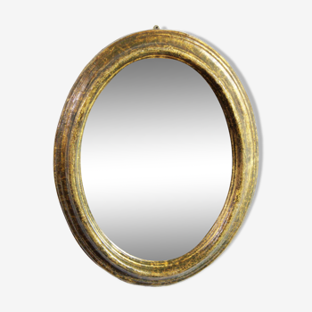 Oval mirror gilded with leaf