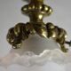 Suspension in bronze and glass paste.