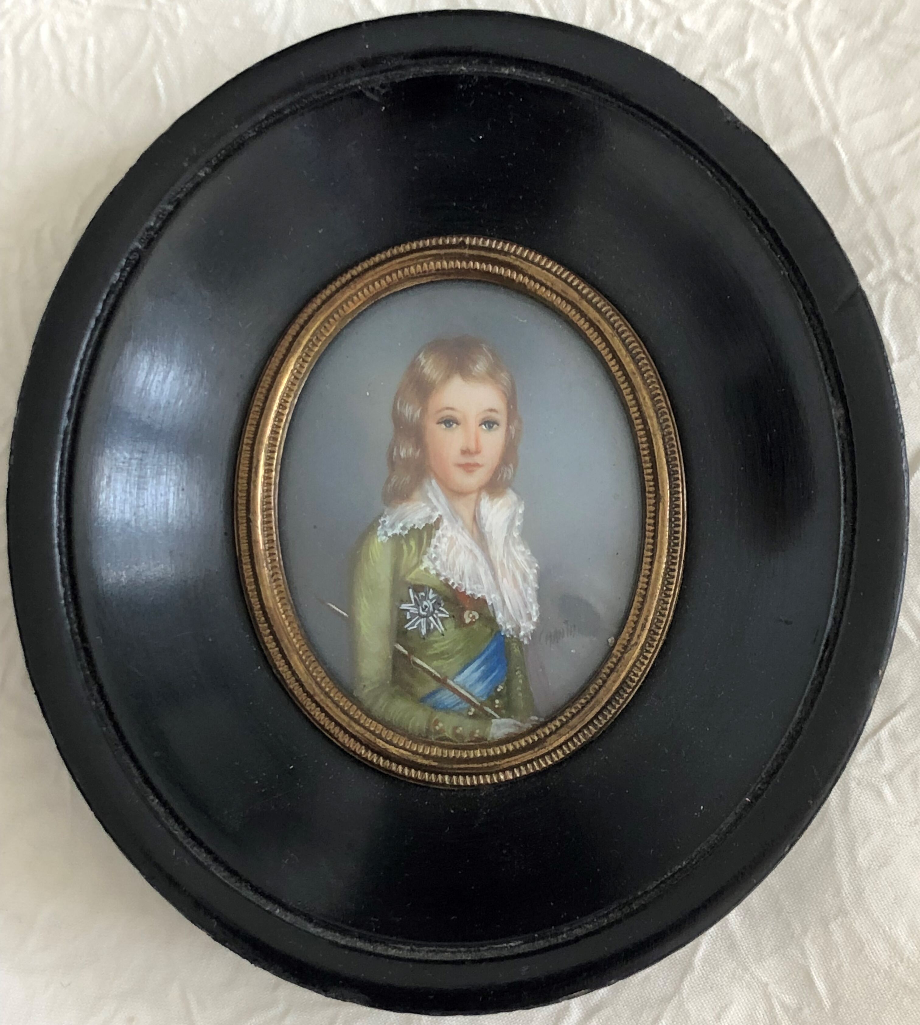 Portrait of a miniature young man