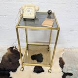 Vintage rolling table in brass and smoked glass