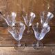 Old pitcher service and 5 foot glasses in engraved glass vintage table art