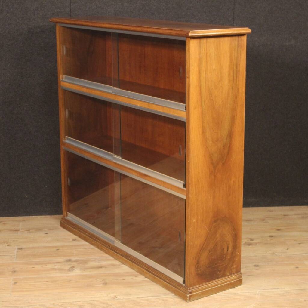 Pair of Italian bookcases in walnut wood with glass doors