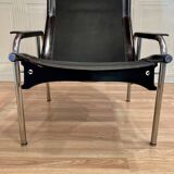 Black leather reclining lounge chair, "Hans Eichenberger" design, 1960.