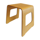 Design stool/side table made of curved plywood.