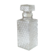 Transparent vintage decanter in chiseled glass and its hermetic cap 70's years