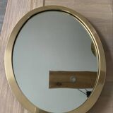 Oval brass mirror