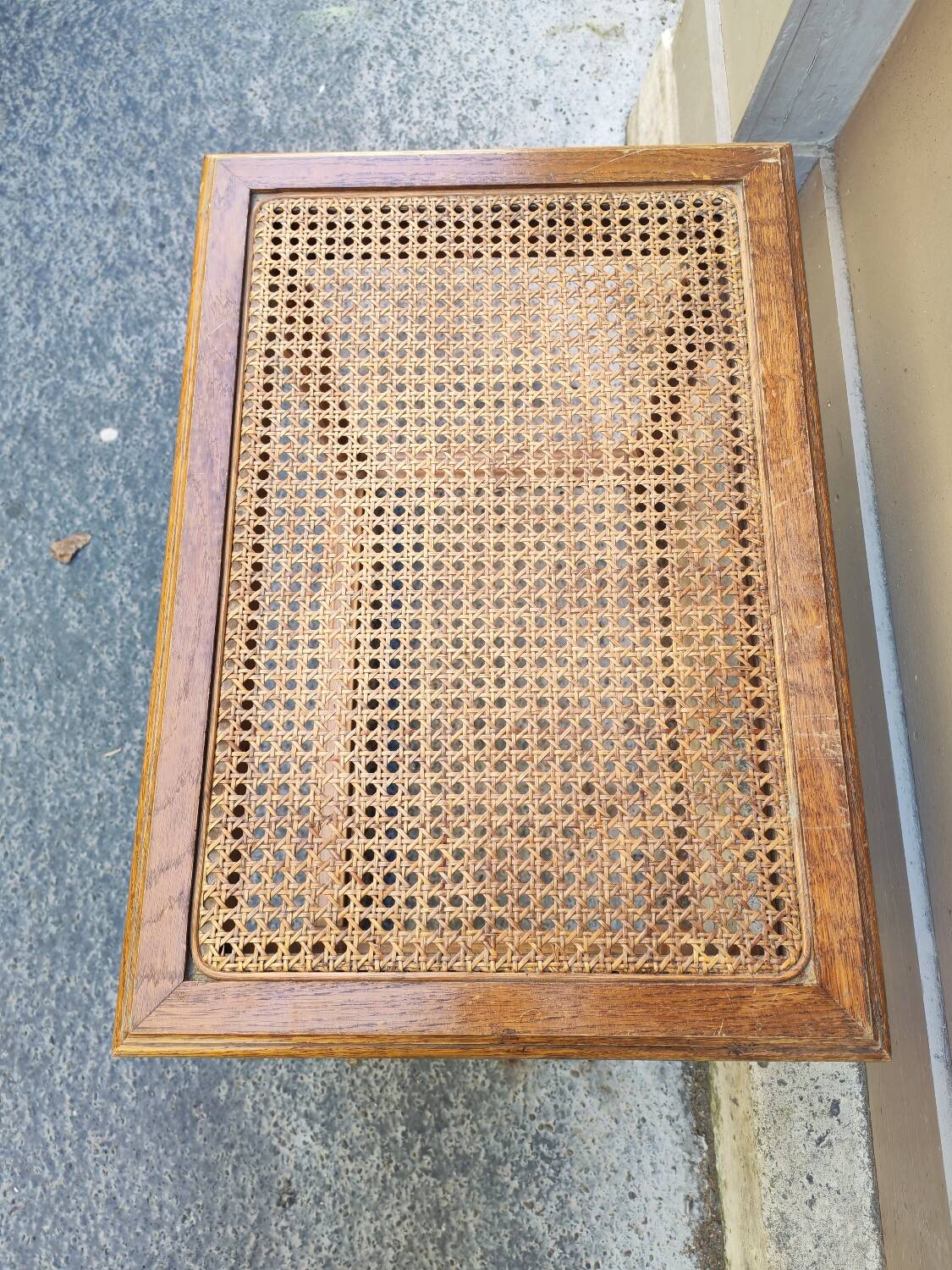 Wooden bench with caning