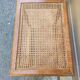 Wooden bench with caning