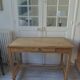 Vintage kitchen table on casters.