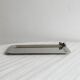 Small vintage metal tray with decorative knot