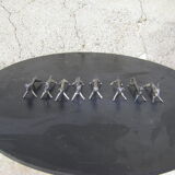Series of eight antique knife holders in silver metal.