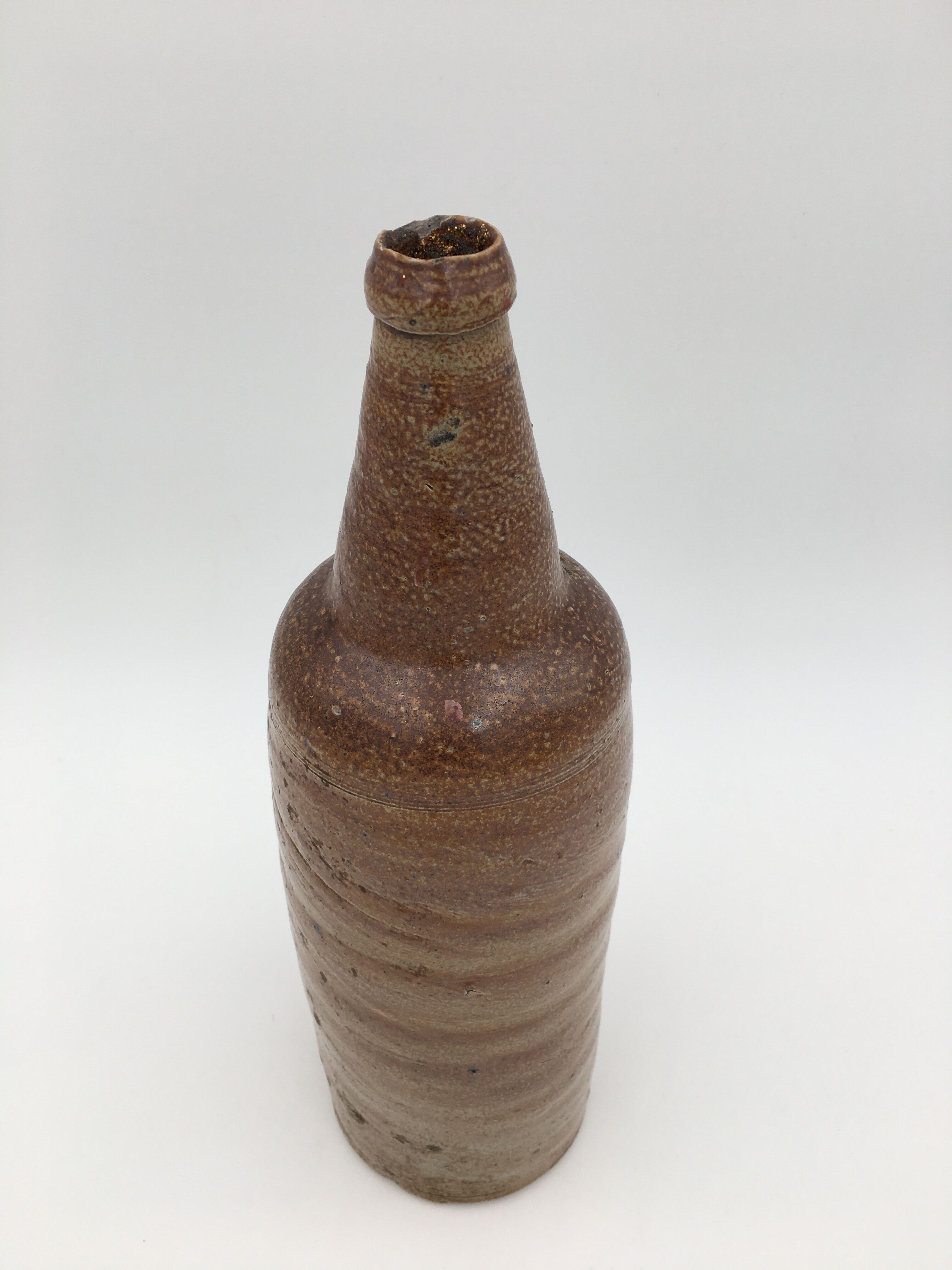 Old glazed terracotta bottle, early 20th century