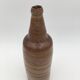 Old glazed terracotta bottle, early 20th century