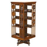Antique Art Nouveau Victorian hand-carved revolving library.