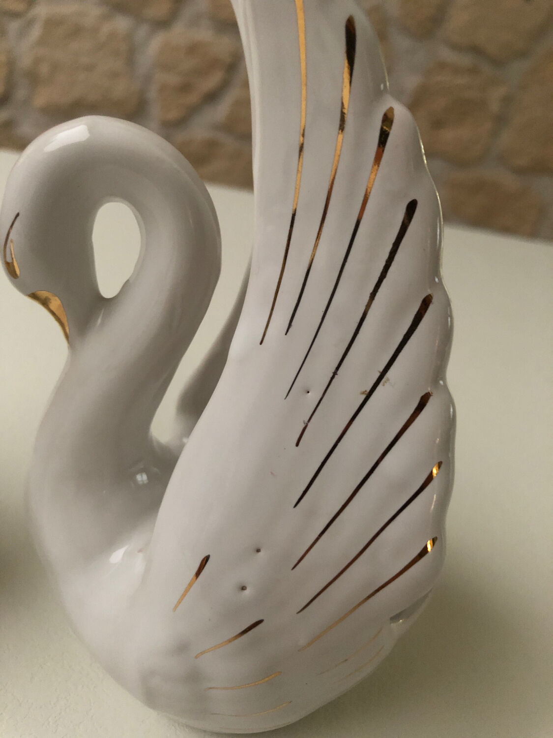 Pair of ceramic swans