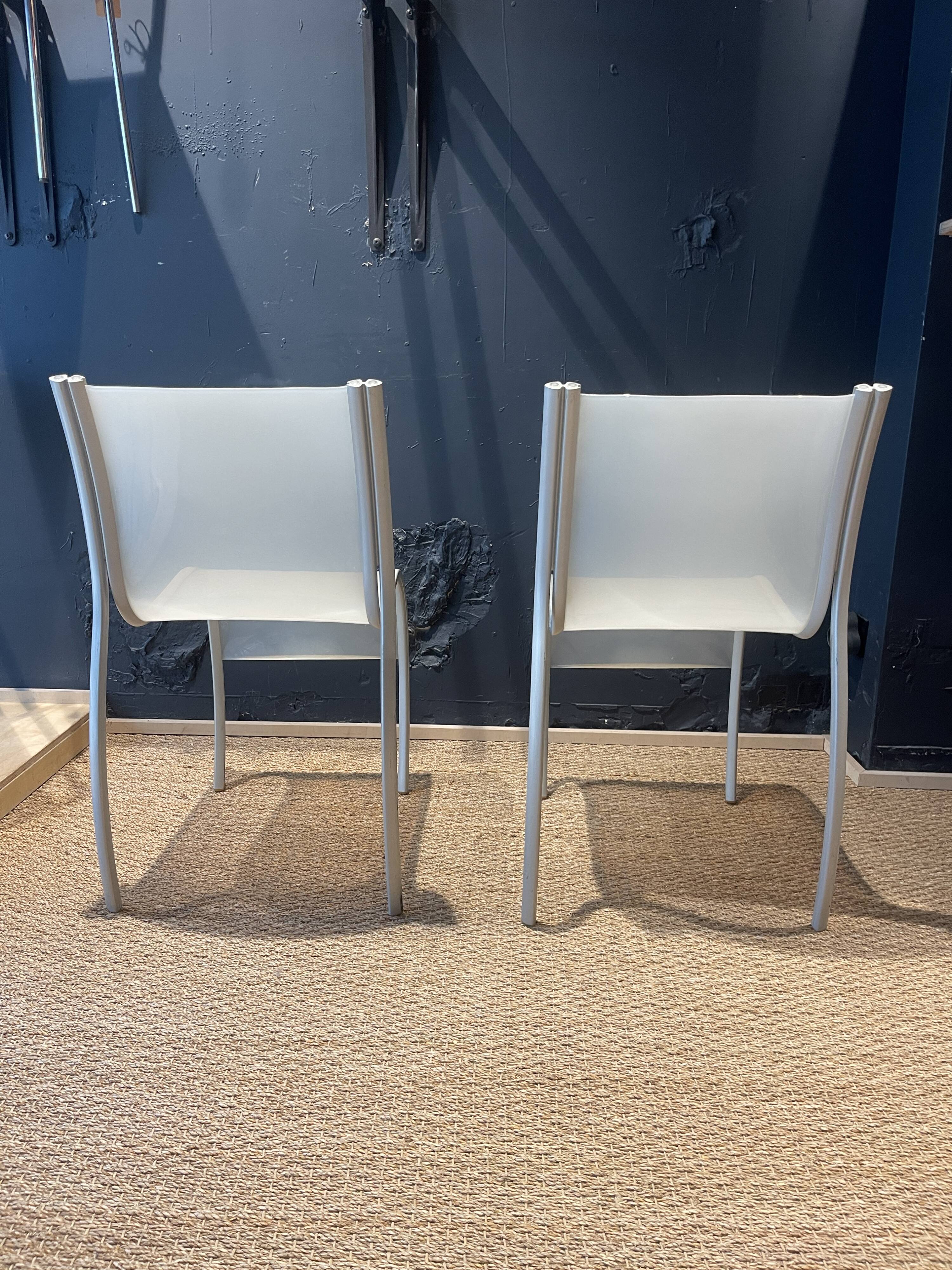Pair of fpe chairs by ron arad for kartell translucent gray italy