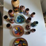 Mid-century pattern Vetrata vases and bowls by Aldo Londi for Bitossi Italy. Black, blue, orange and yellow on a brushed background.