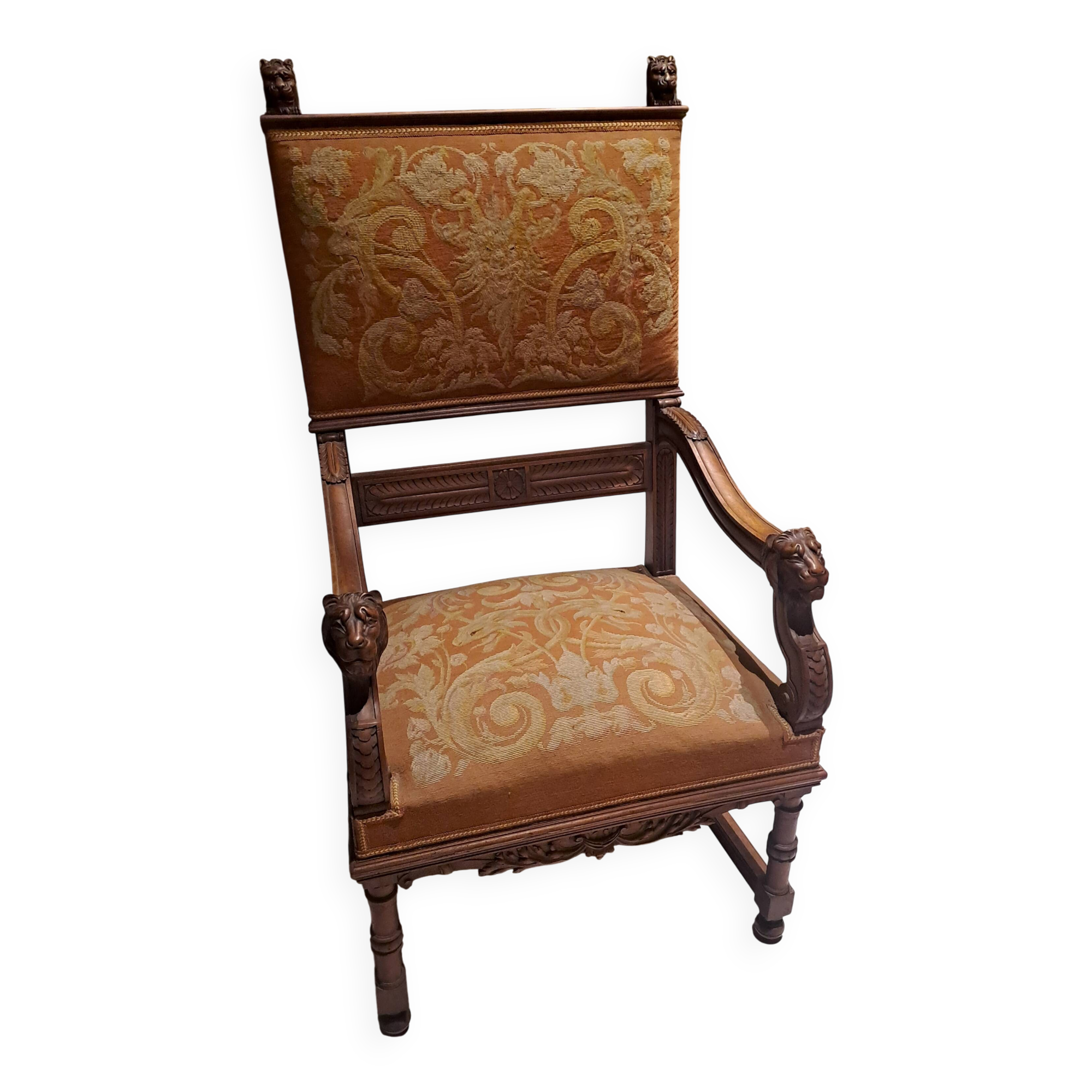 Antique lion head armchair