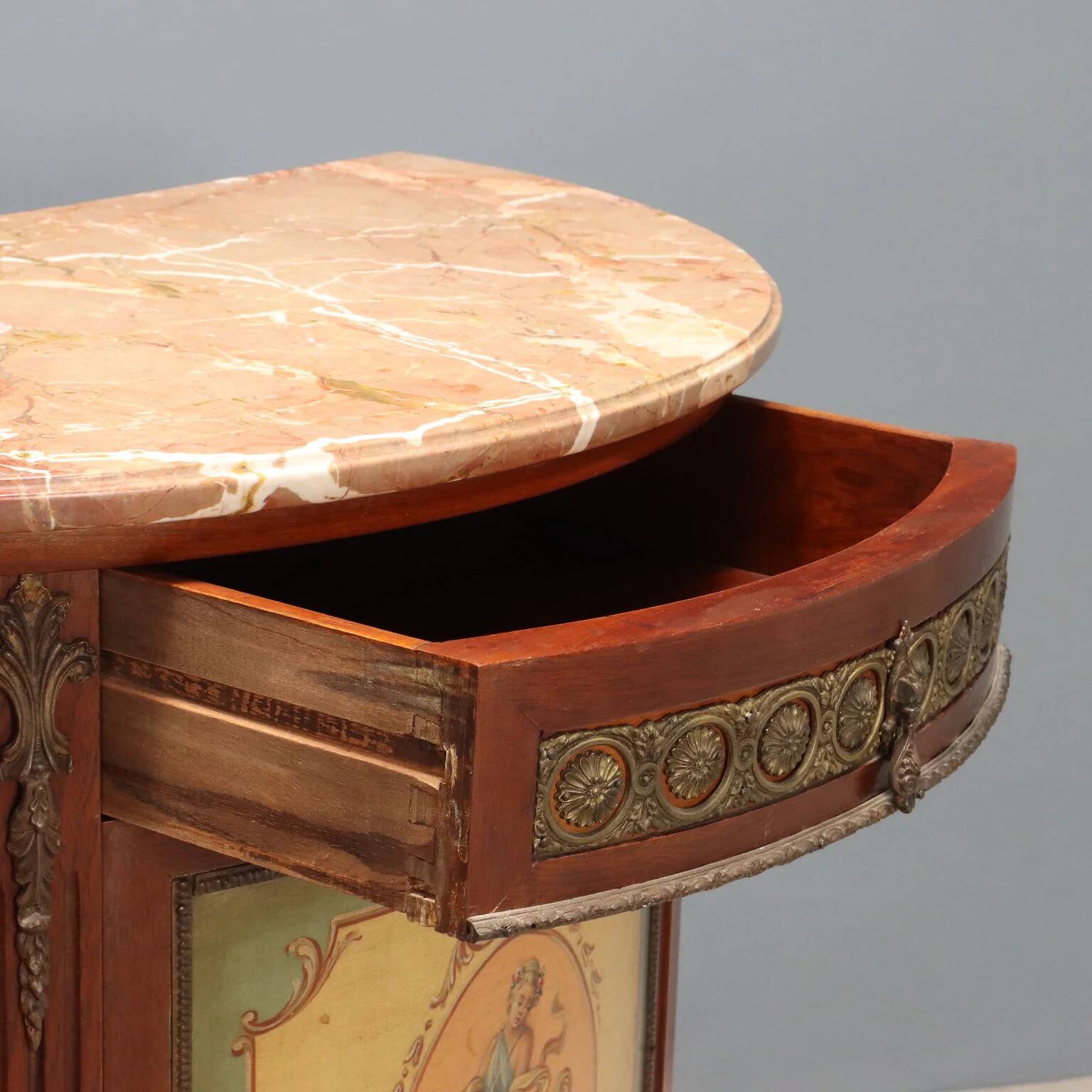 Antique demi-lune buffets in neoclassical style in mahogany from the 20th century.