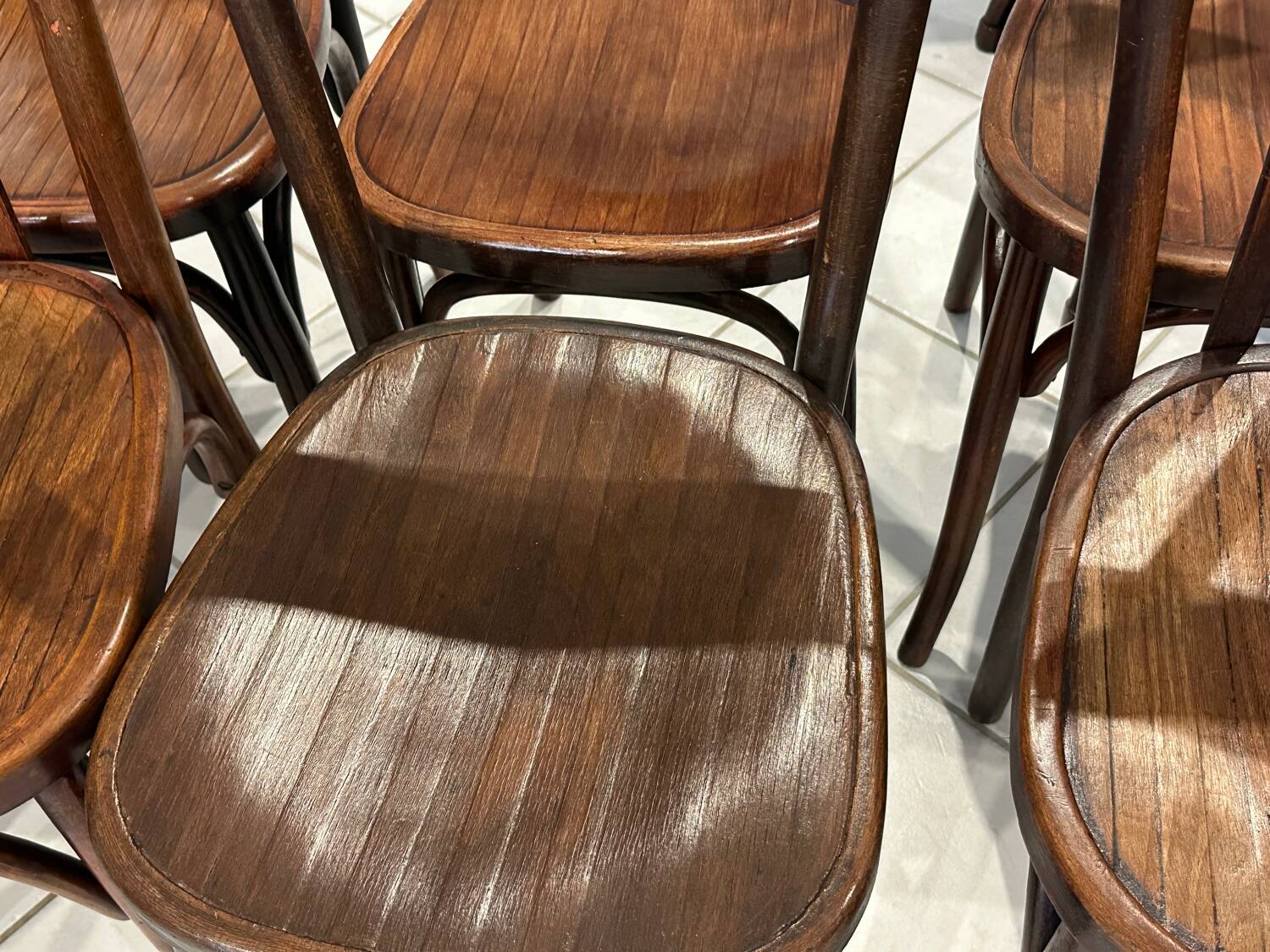 Set of 12 mismatched bistro chairs Baumann & Fischel 1930