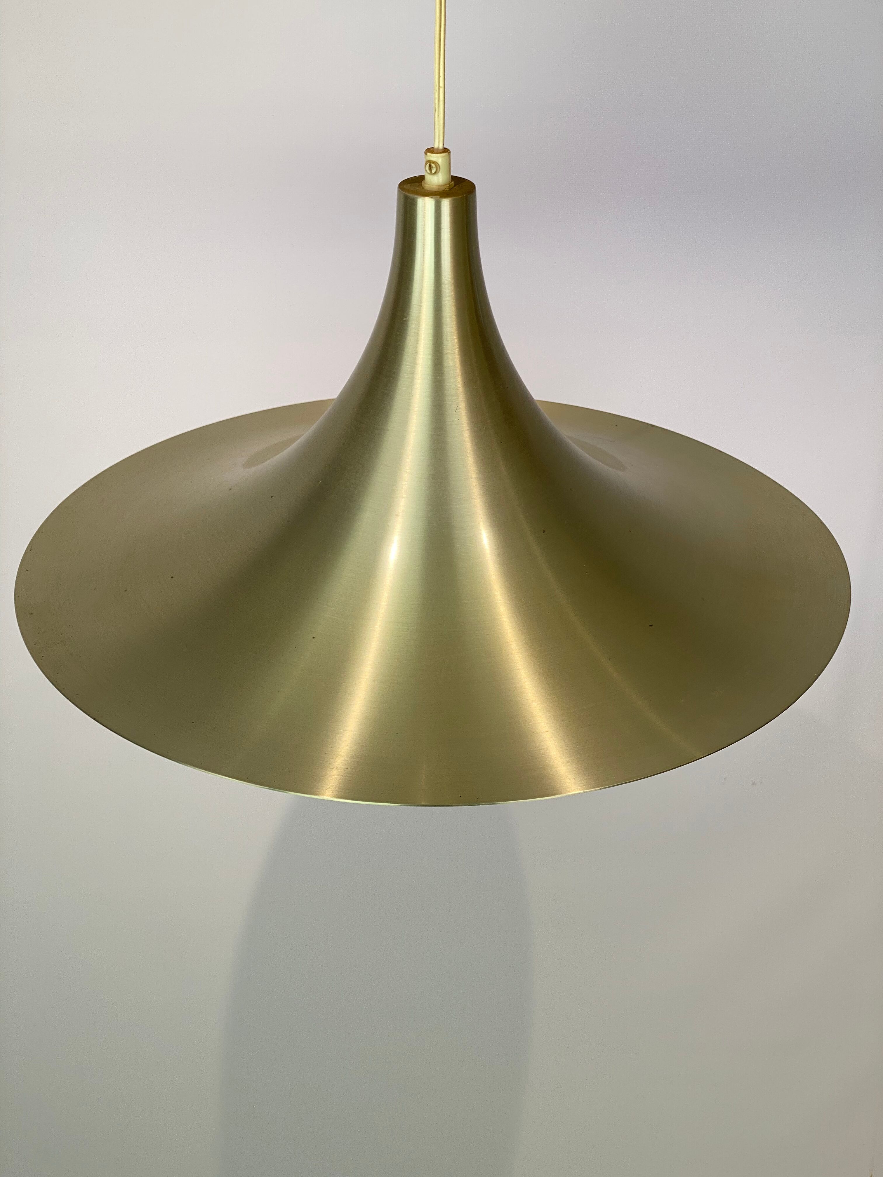 Gubi Semi pendant of brass designed by Claus Bonderup and Thorsten Thorup in 1968