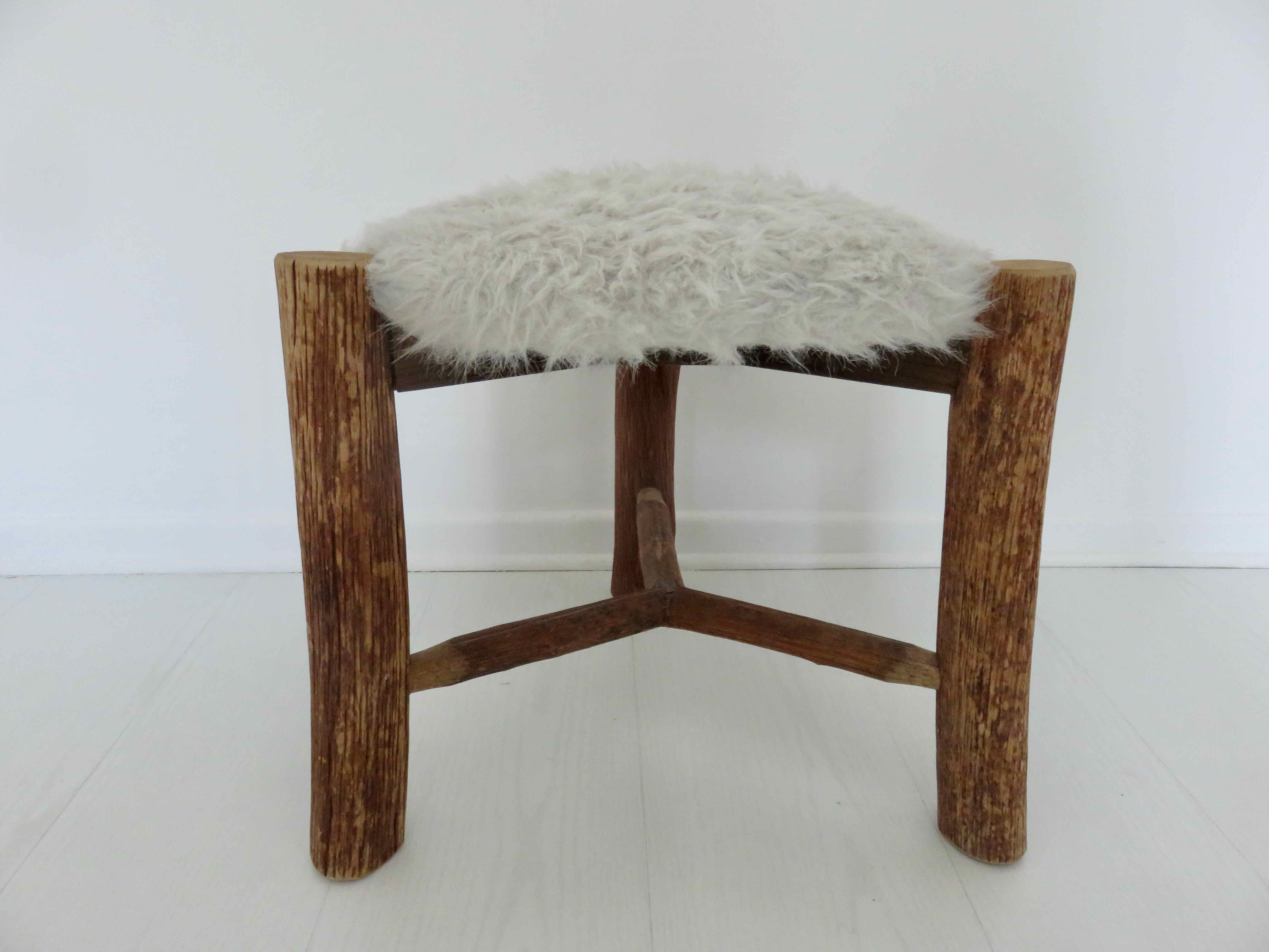 Scandinavian stool "mountain chalet" tripod wood, seat in vintage moumoute