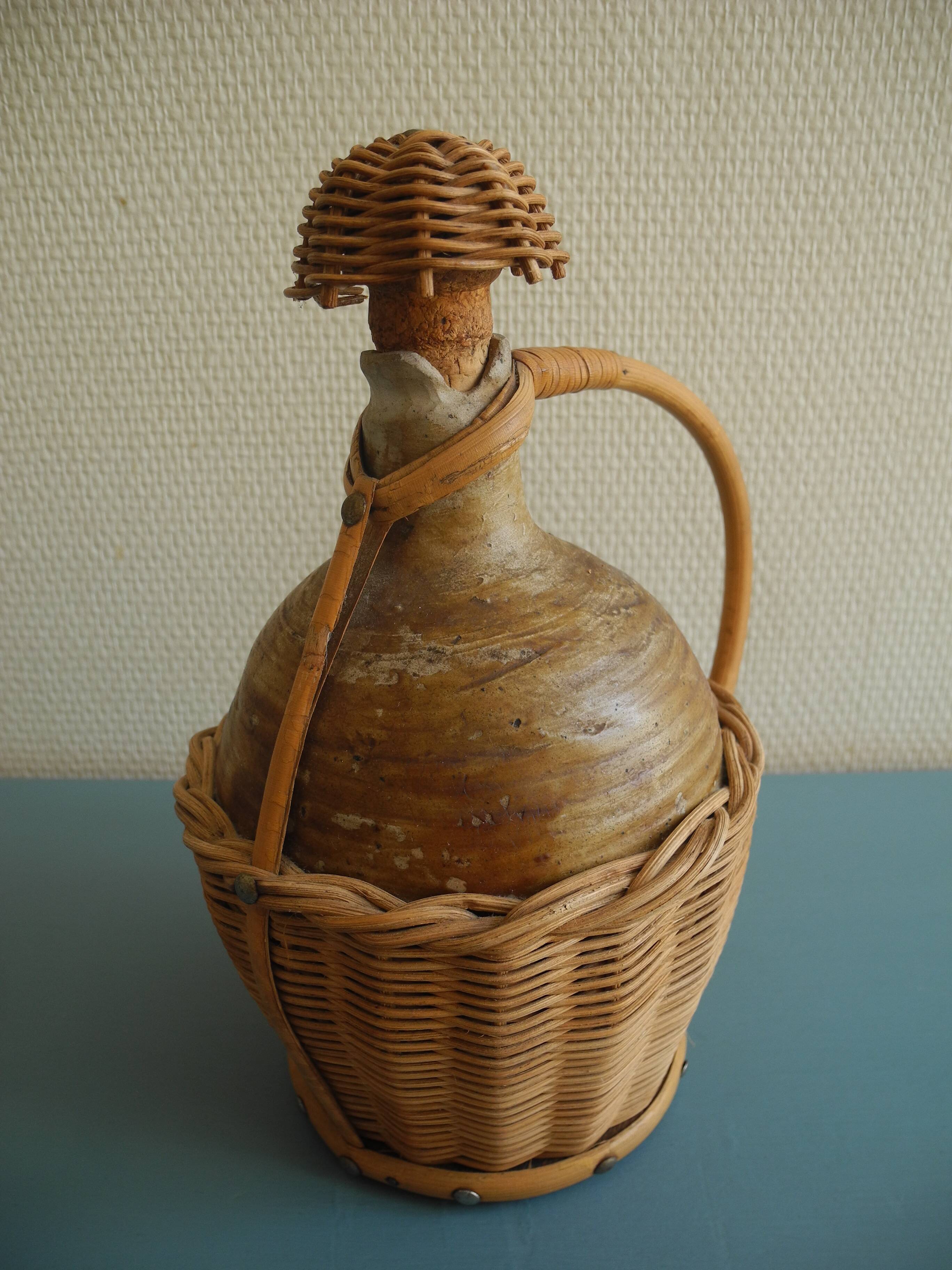 old stoneware bottle wicker vintage decoration stoneware bottle wicker