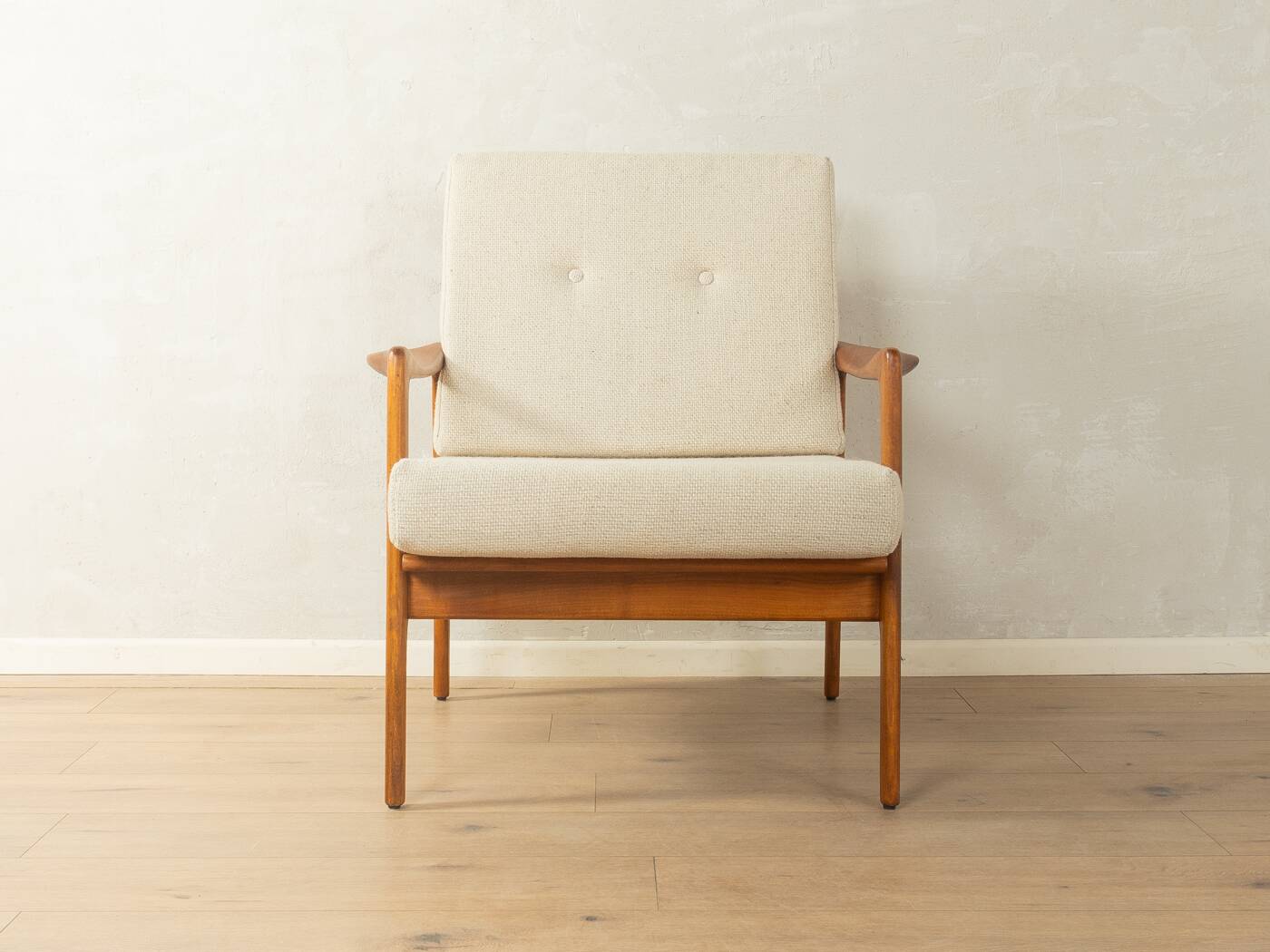 Elegant mid-century armchair from the 1960s with cream-white upholstery