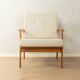 Elegant mid-century armchair from the 1960s with cream-white upholstery