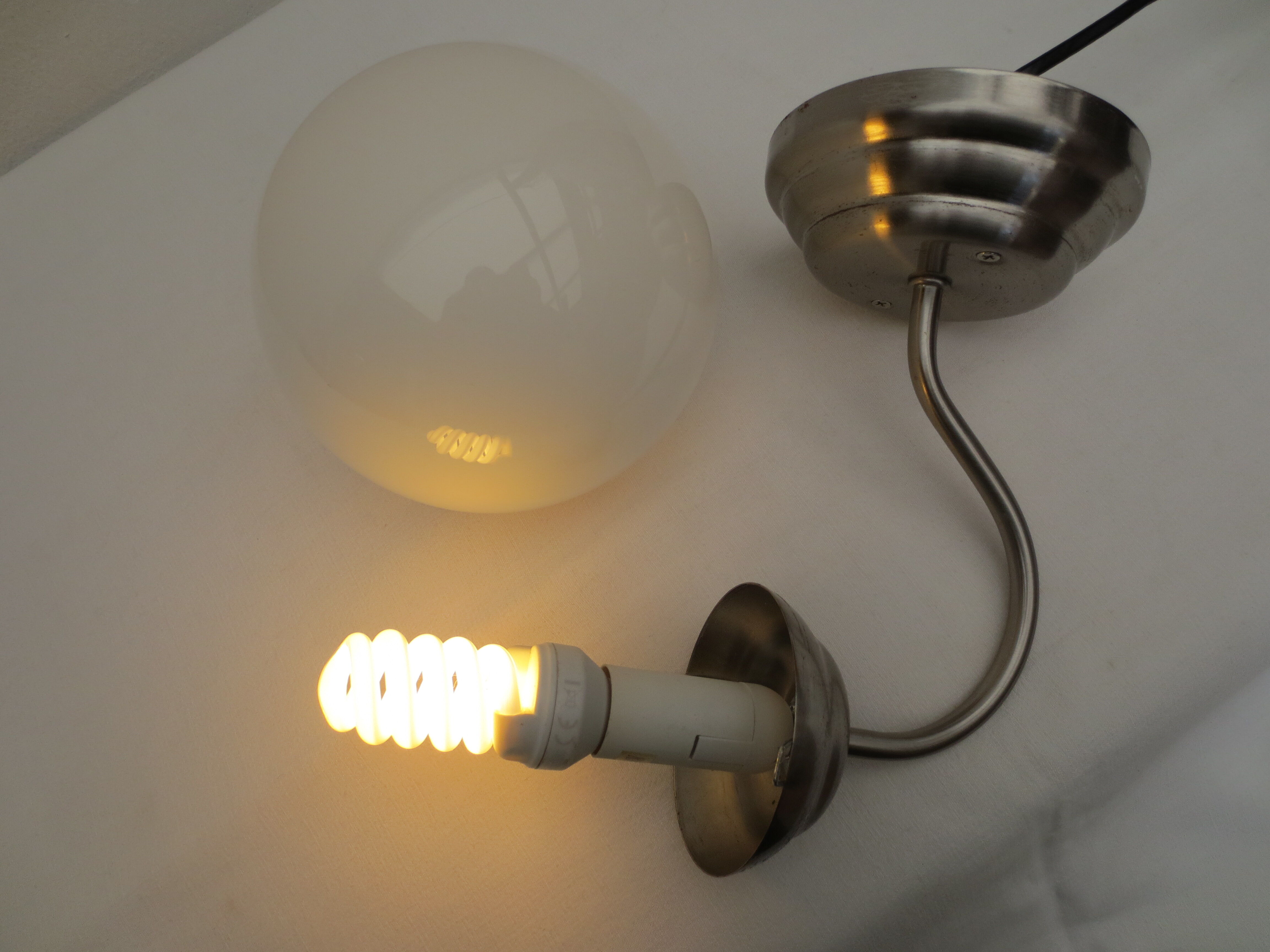 Gooseneck wall lamp, white opaline round globe