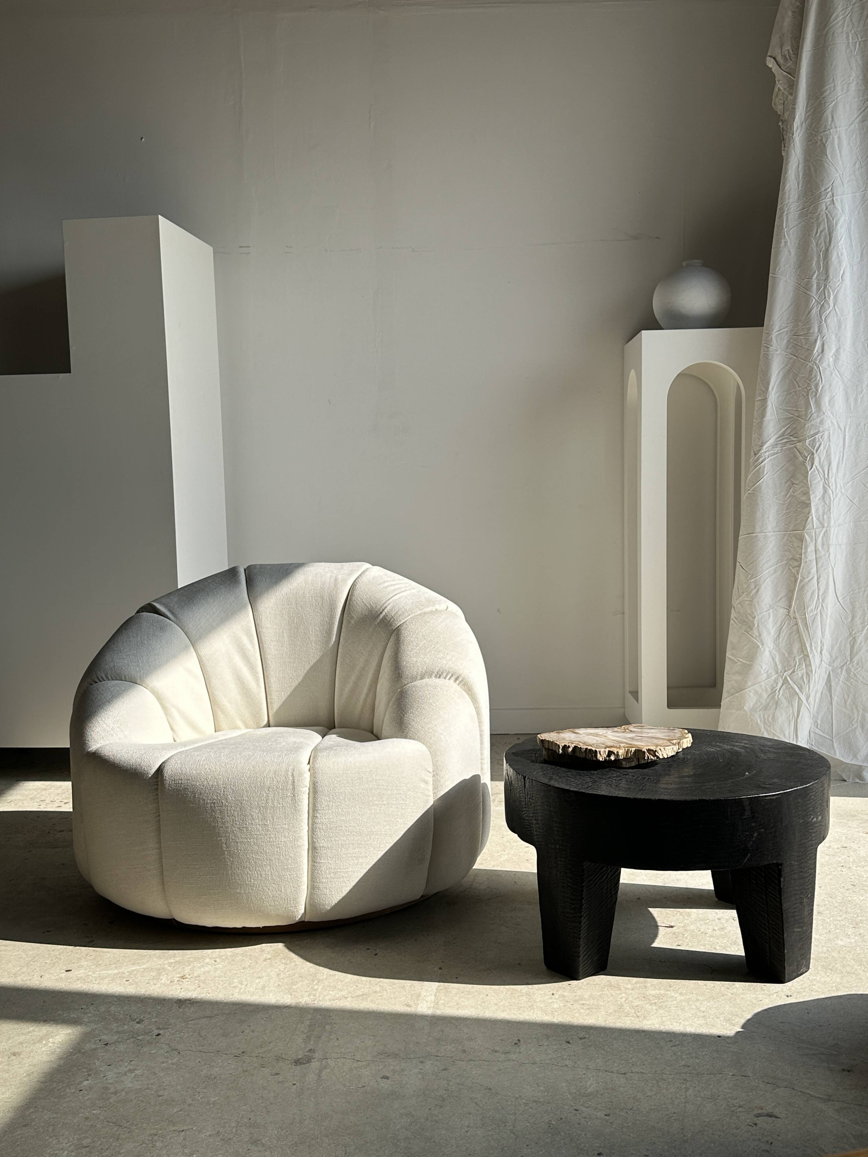 Large white circular armchair, white fabric upholstery