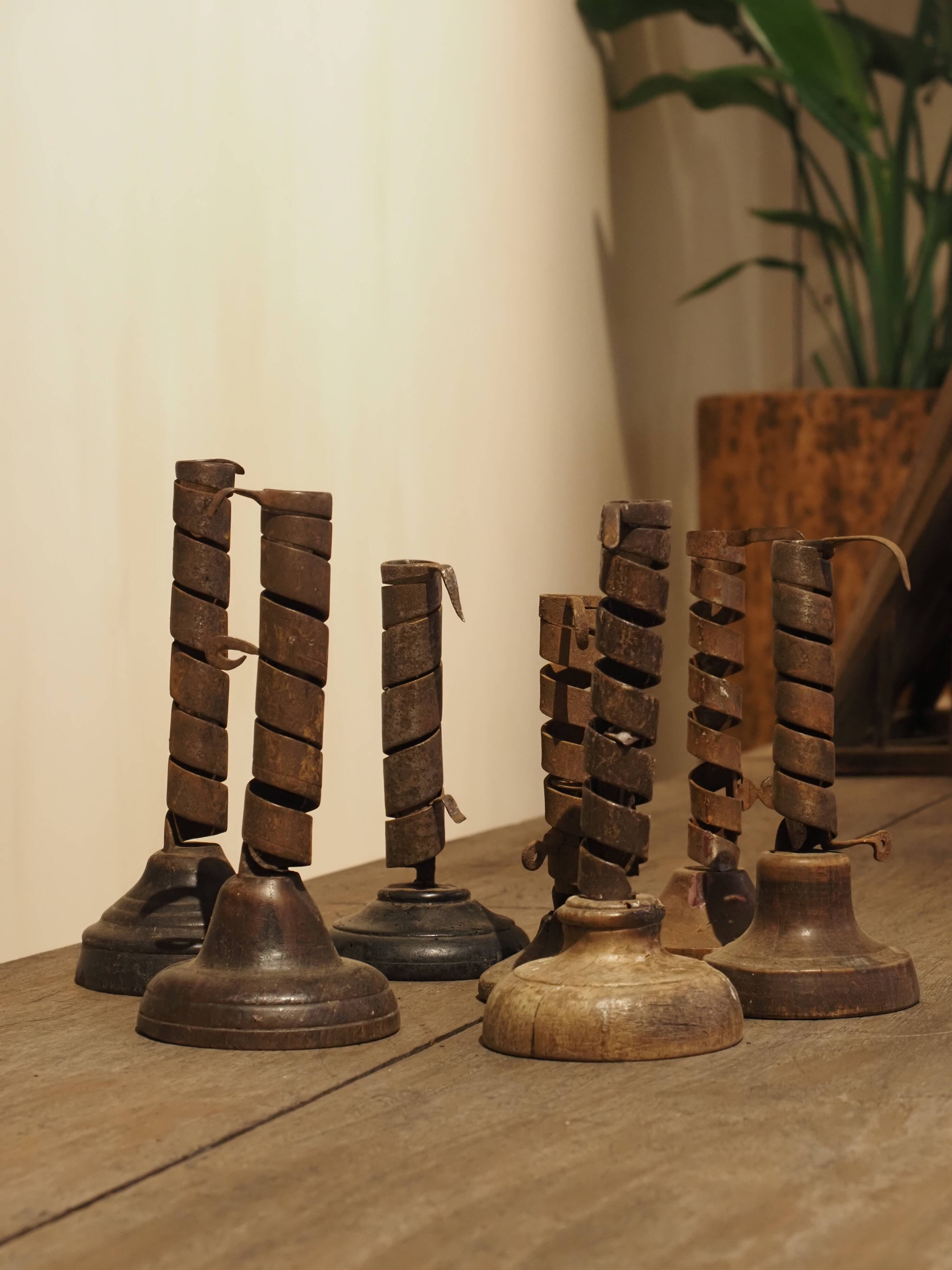 19th-century wrought iron "Rat de Cave" candlesticks from Normandy, set of 7.