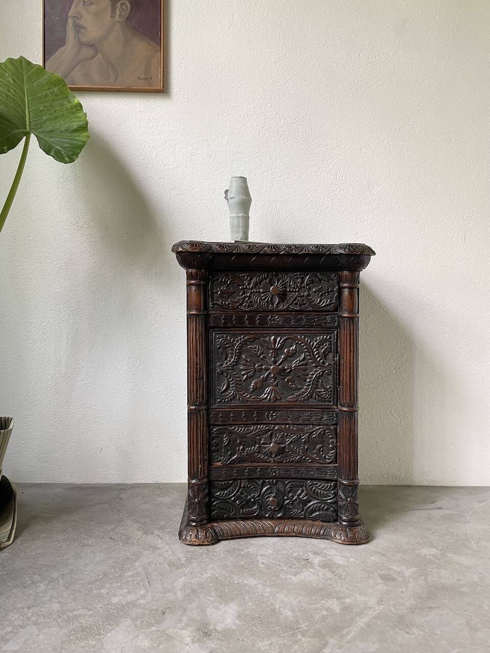 19th century chest of drawers in carved blackened pine