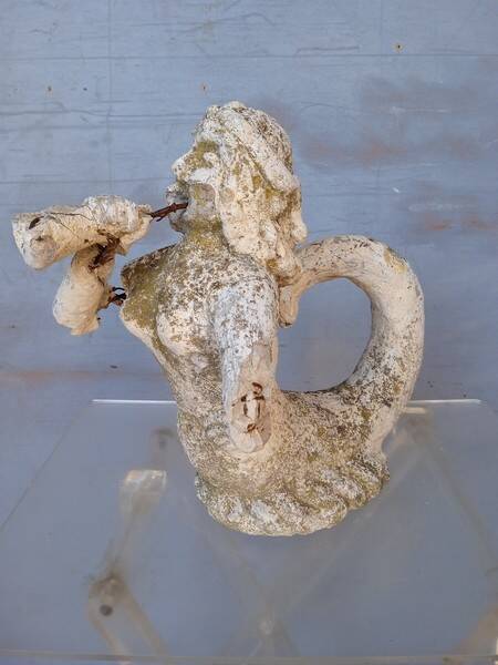 Gargoyle in cement mermaid bugle cathedral ep 1950