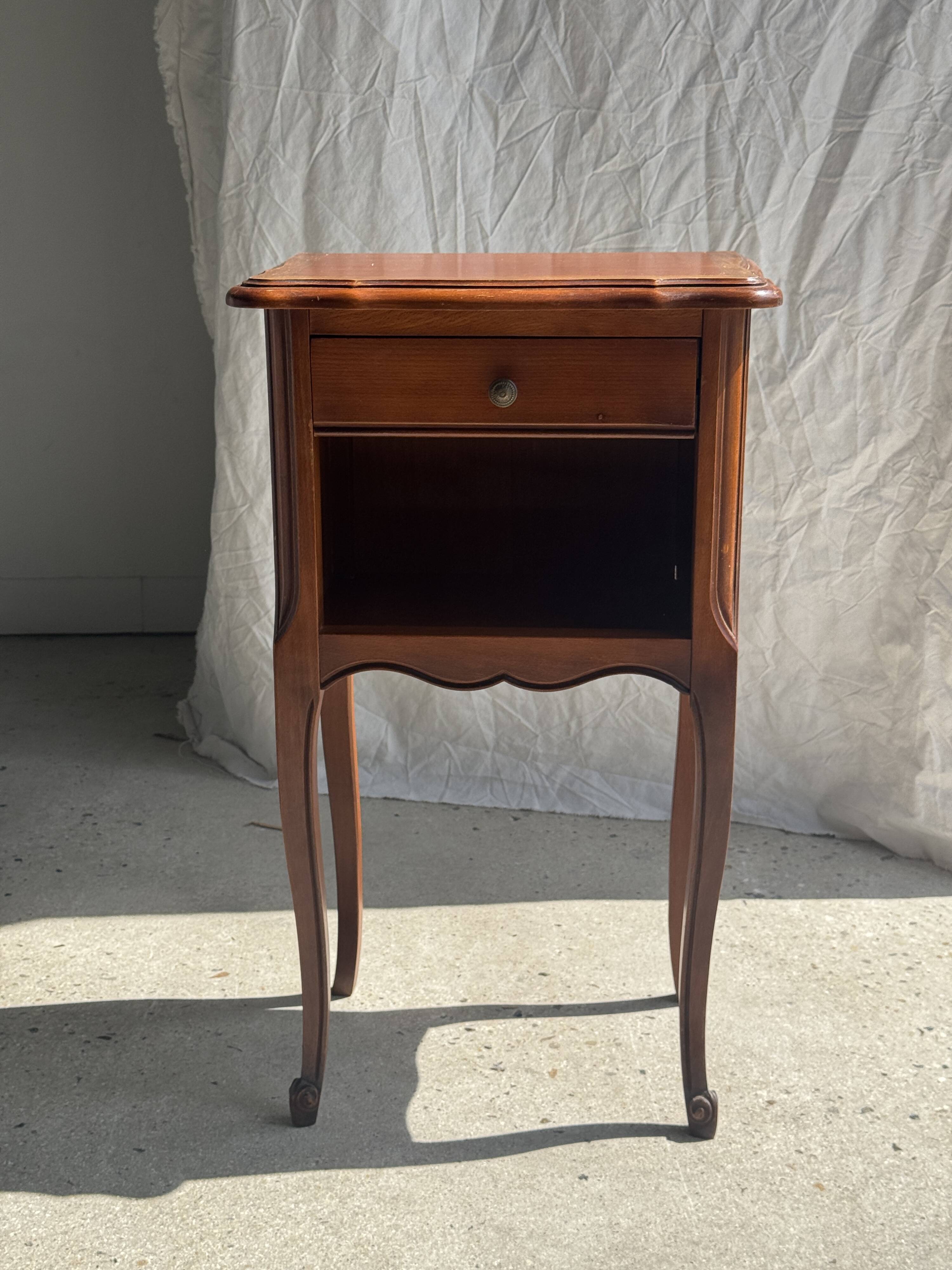 Classic wooden bedside table with drawer