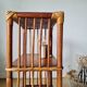 Shelf - rattan wood bookcase with a patina finish.