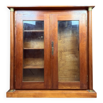 Empire style gun cabinet in cherry wood circa 1900