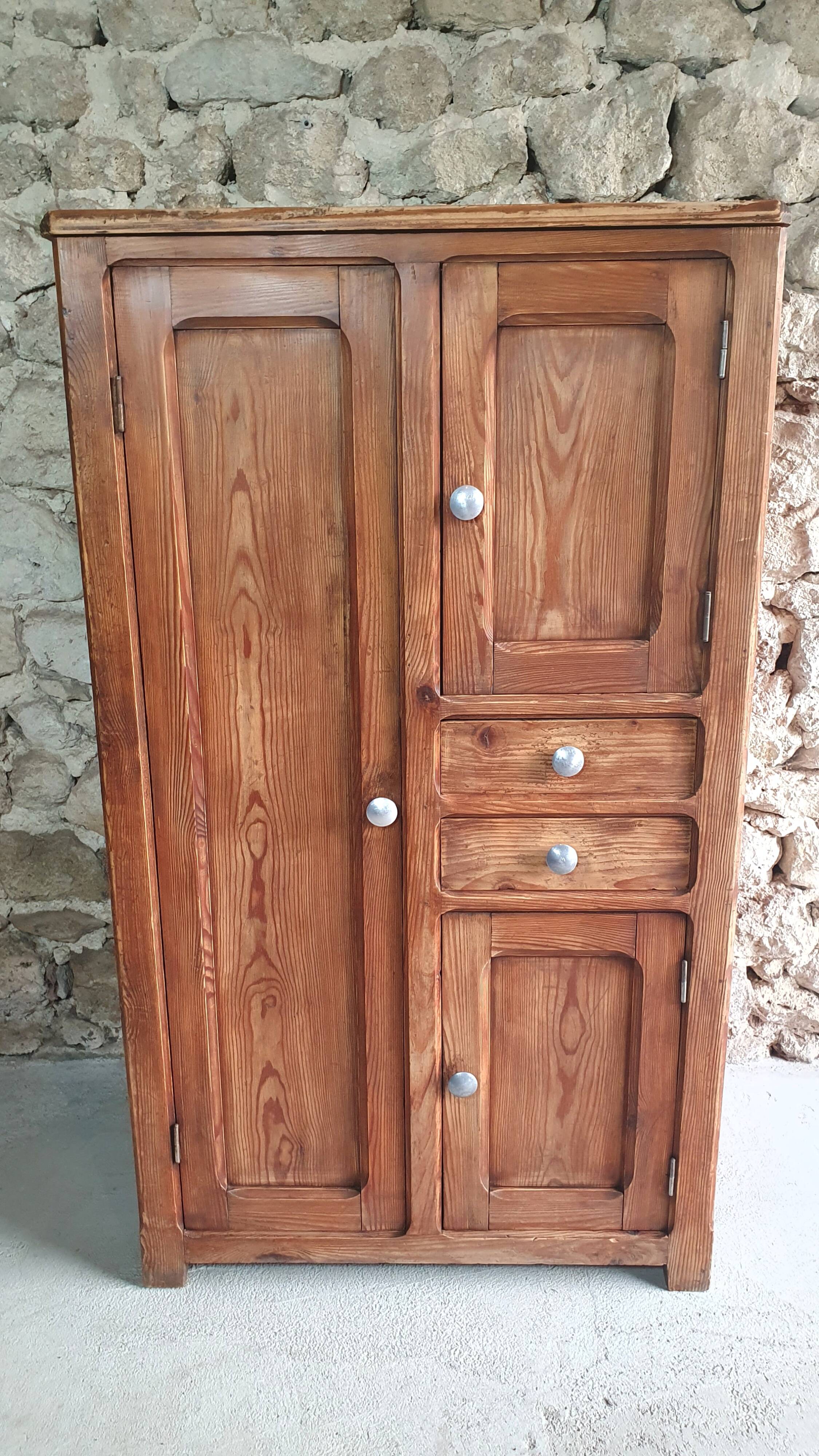 Small cabinet made of raw wood