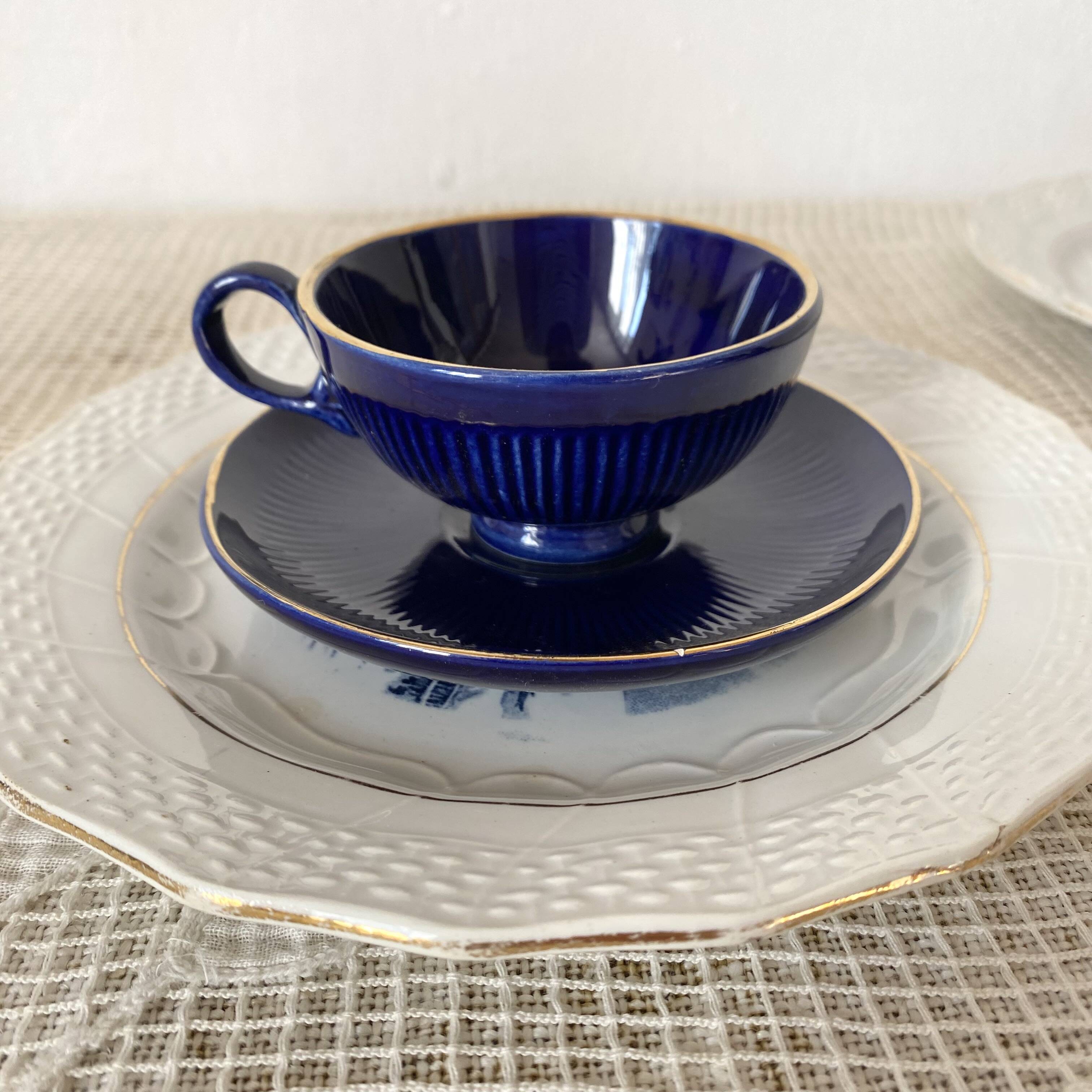 Midnight blue and gold coffee cups and saucers