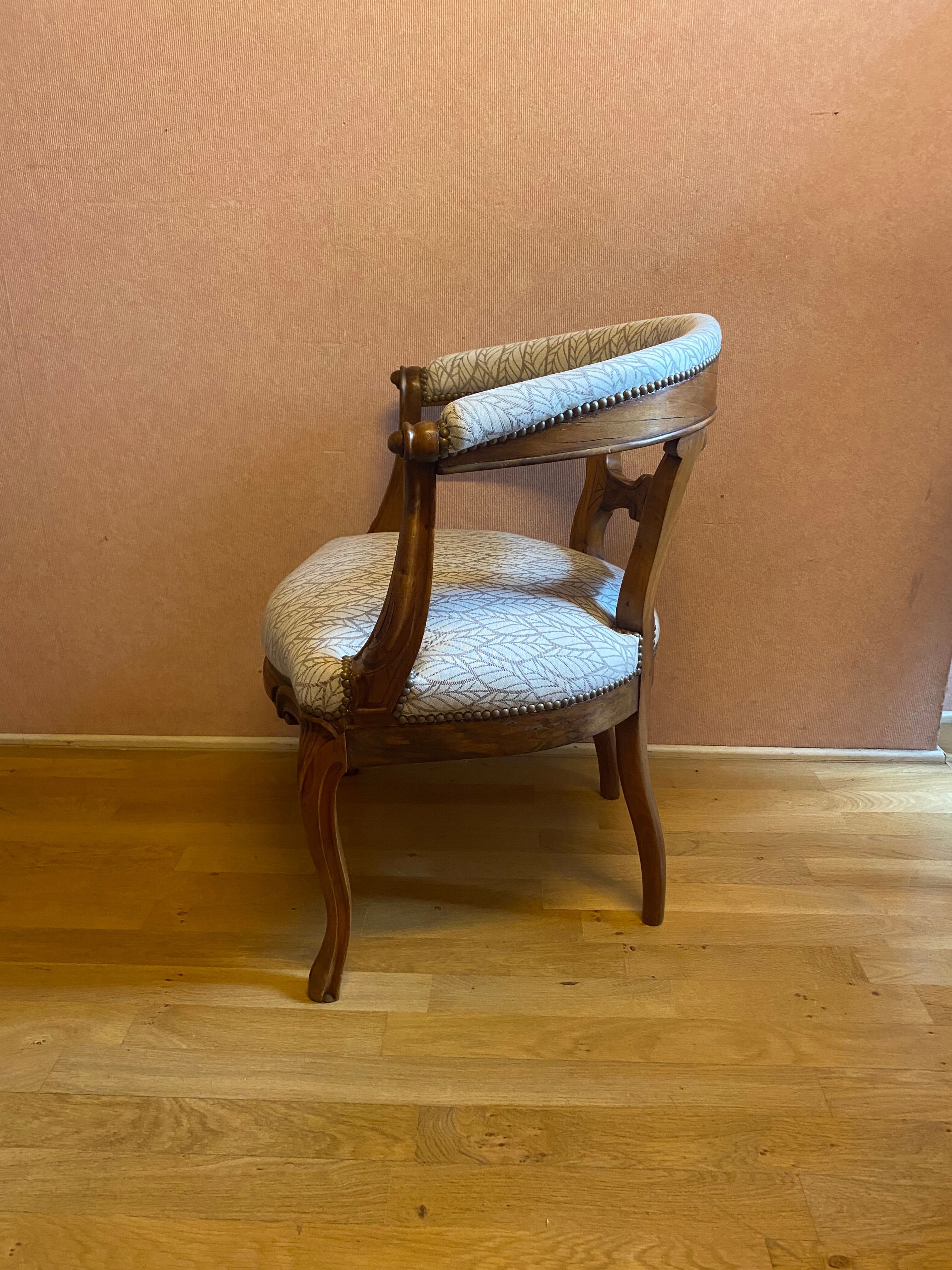 office armchair in walnut, nineteenth century, fully trimmed and reupholstered.
