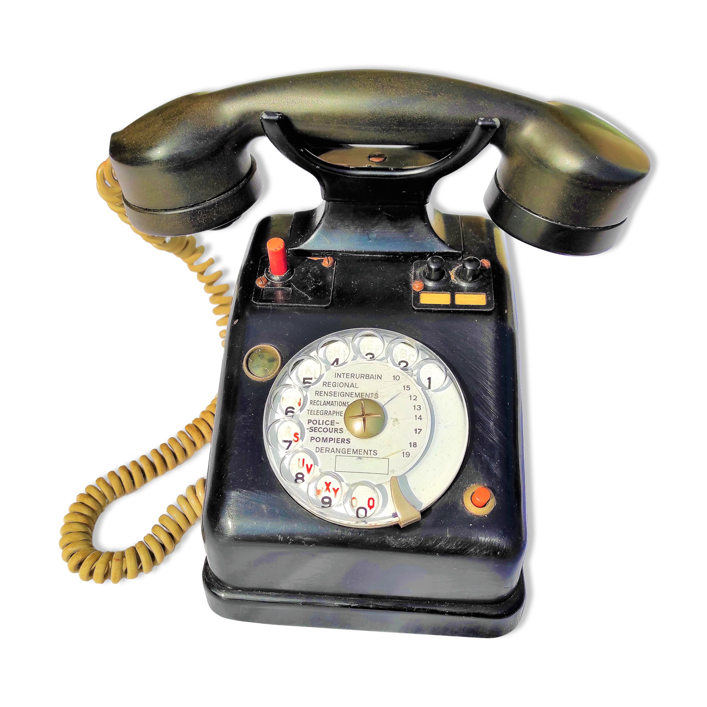 Telephone in black bakelite dial with call system