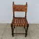 Spanish chair in oak with thick cognac leather straps, 1940s.