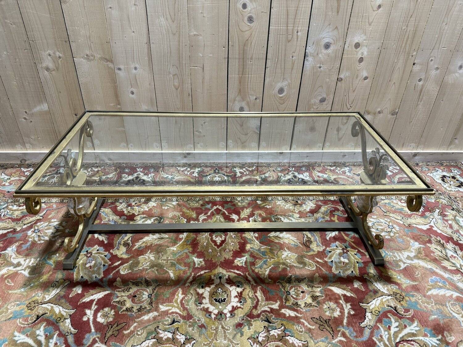 Gold metal and glass coffee table attributed to the BAGUÈS house.