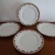 4 assiettes plates porcelaine Limoges Theodore Haviland motifs Art Deco Ø 24, cm